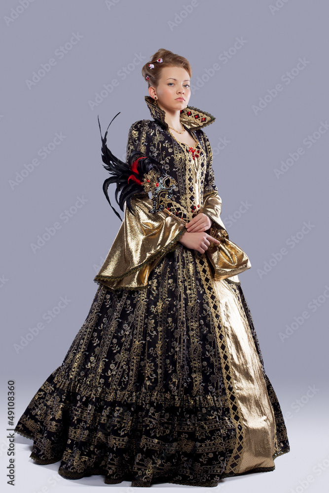 Fototapeta premium Pretty girl in carnival costume middle age