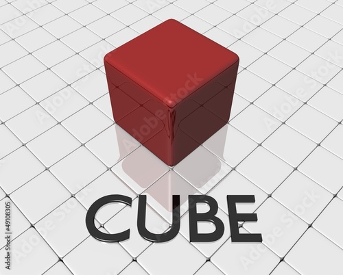 Red cube on a white smooth surface
