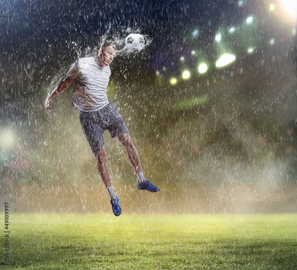 football player striking the ball football player striking the ball