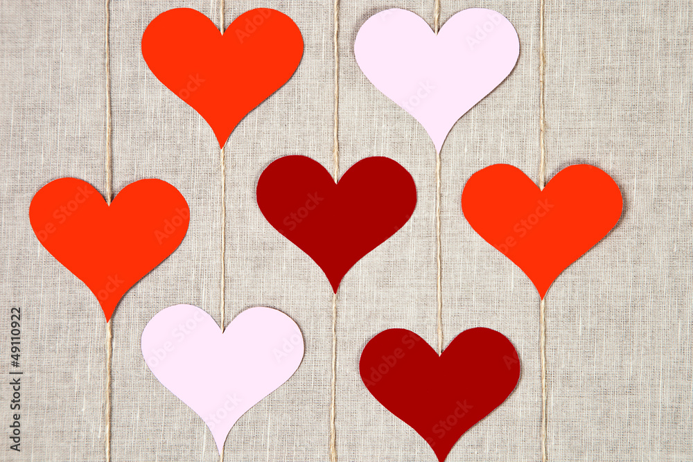 Hearts garlands on linen background Hearts garlands on linen background