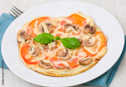 omelet with mushrooms, tomatoes and cheese
