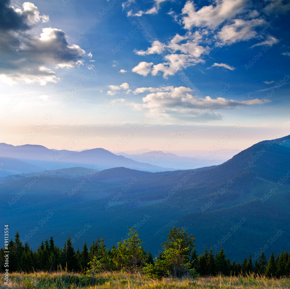 View of misty fog mountains in autumn