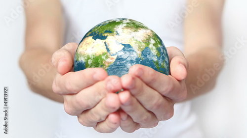 Earth in hands.
