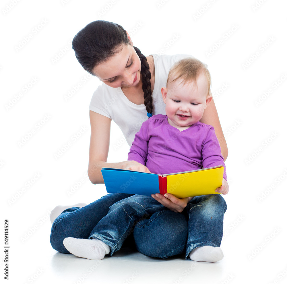 happy mother reading a book to kid girl happy mother reading a book to kid girl
