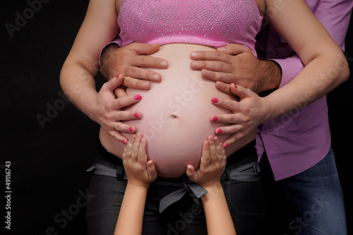 pregnant woman with a family.