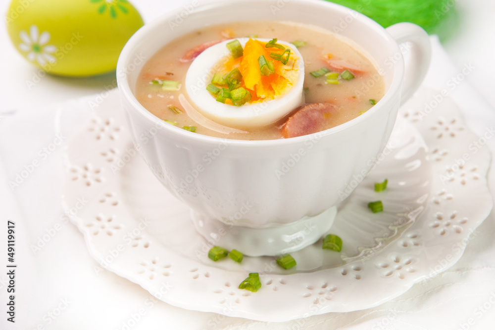 White borscht with eggs and white sausage.Polish easter soup White borscht with eggs and white sausage.Polish easter soup