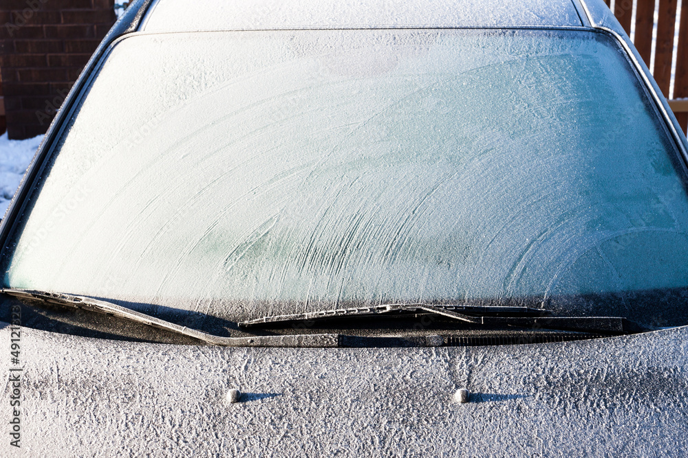 Obraz premium Frost on a completely covered car windscreen