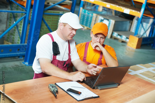 manual workers in warehouse