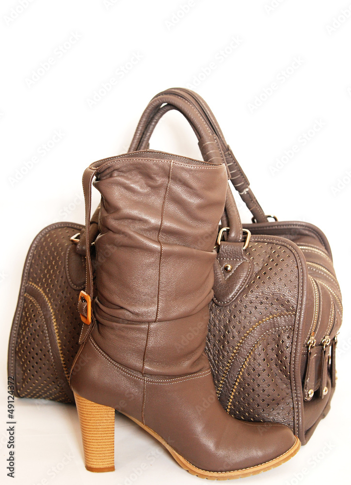 Naklejka premium Boots and leather bag