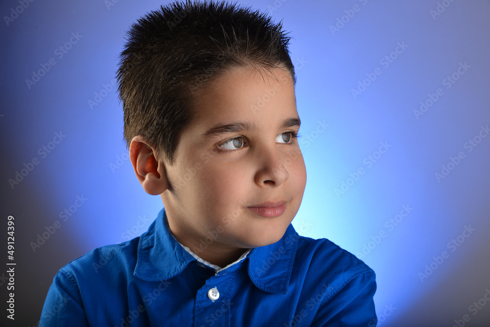 Cute boy looking up at copy space for your text Cute boy looking up at copy space for your text