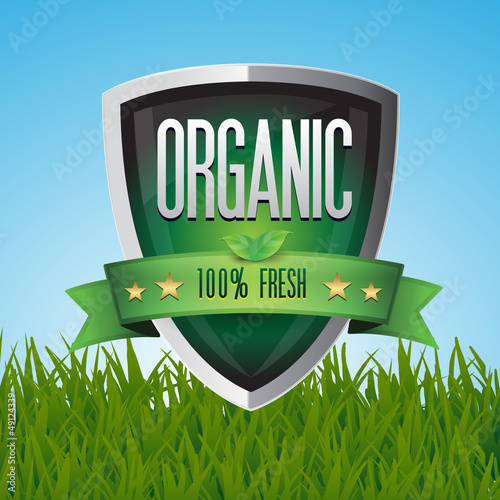 Green 100% organic shield on grass