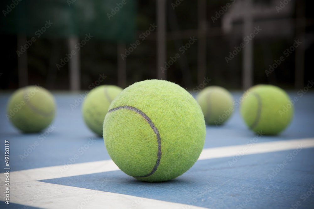 tennis ball on court field