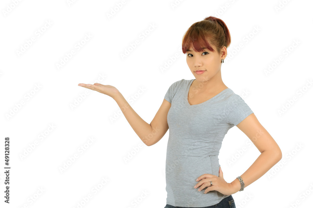 Isolated young asian woman presenting over white Isolated young asian woman presenting over white