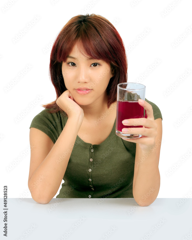Isolated young asian woman with grapes juice over white. Isolated young asian woman with grapes juice over white.