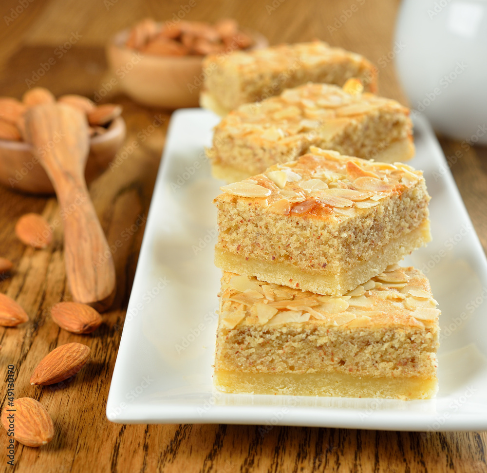 almond cakes on a brown table almond cakes on a brown table