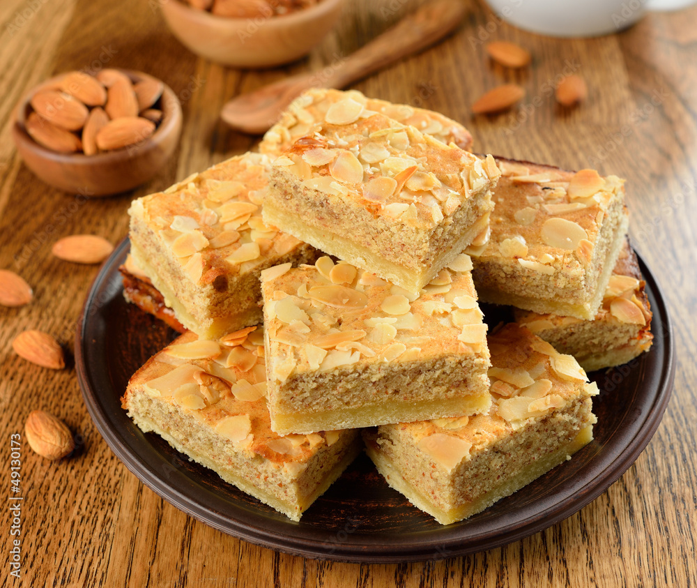 almond cakes on a brown table almond cakes on a brown table