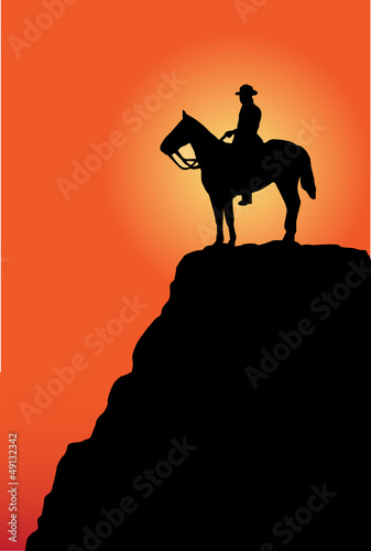 man on the horse at sunrise or sunset