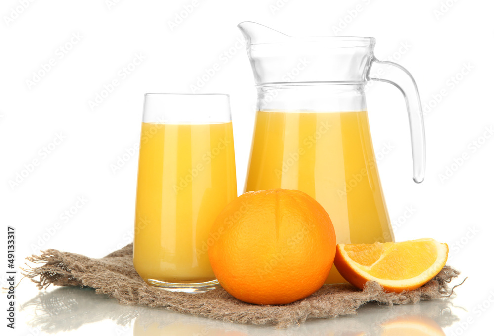 Full glass and jug of orange juice and oranges isolated on Full glass and jug of orange juice and oranges isolated on