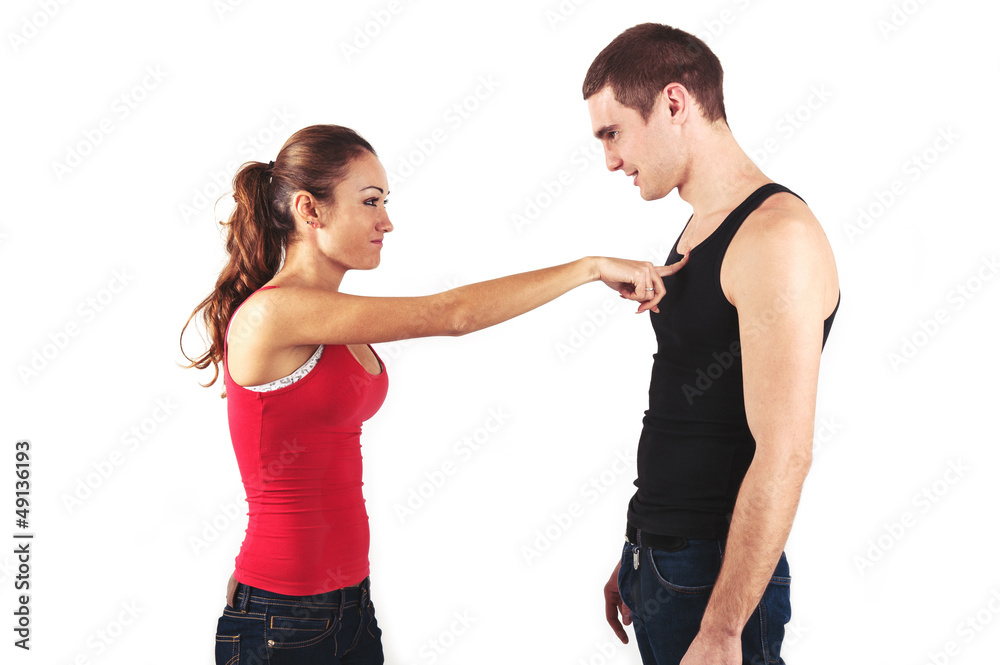 Young couple quarreling isolated on white background. Young couple quarreling isolated on white background.