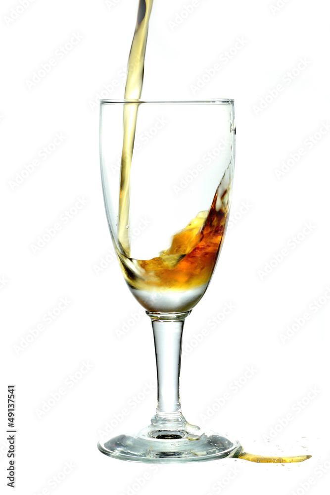 pouring whiskey into wine glass pouring whiskey into wine glass