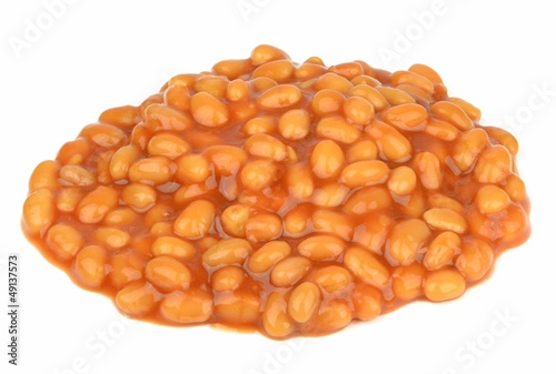 A pile of baked beans in tomato sauce on a white background