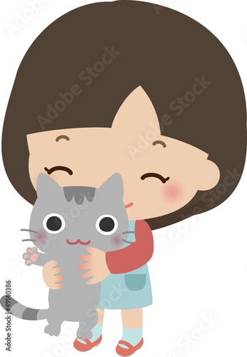 猫を抱いた小さい女の子