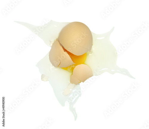 Naklejka Broken egg on white background