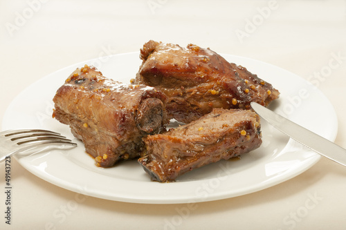 spareribs cooked in mustard and honey sauce