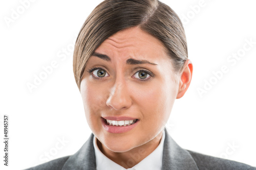 Portrait of shocked and confused business woman on white backgro