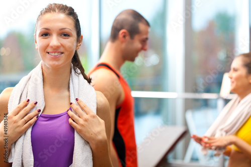 Smiling woman in a fitness club