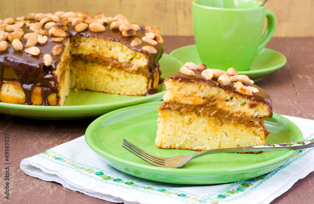 Peanut and caramel cake with chocolate glaze