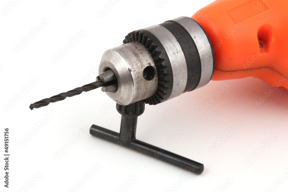 Electric drill on a white background.