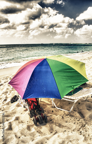 Sandy Beach with colorful Beach Umbrella