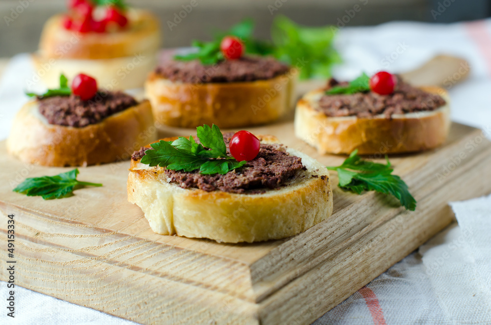 Crostini with liver pate and berries