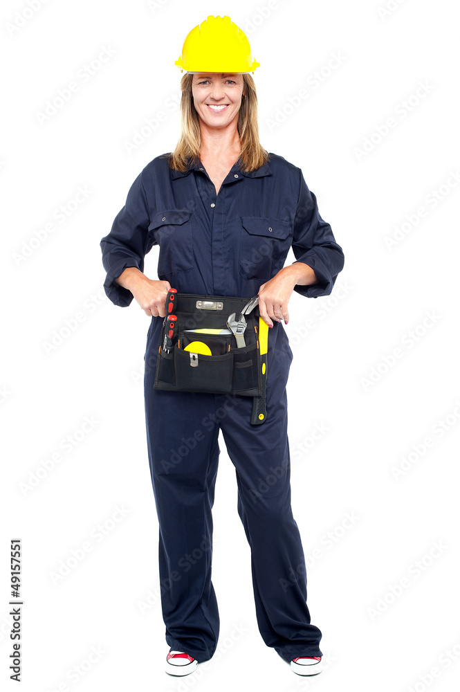 Beautiful construction worker with tool belt Beautiful construction worker with tool belt