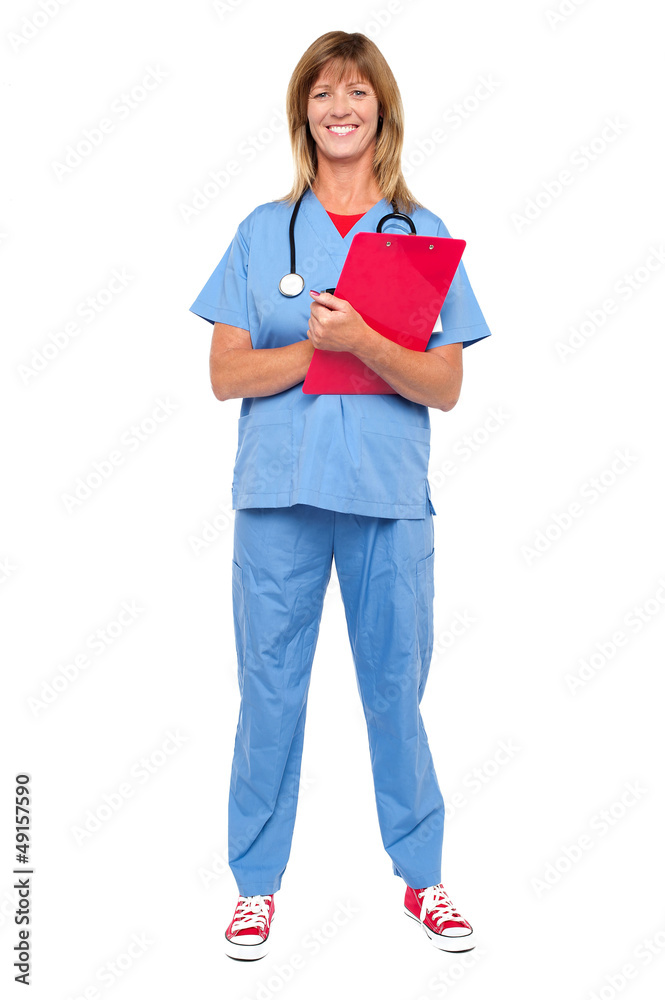 Smiling confident doctor holding clipboard Smiling confident doctor holding clipboard