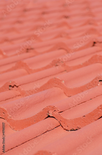 Closeup red roof tiles blurred background