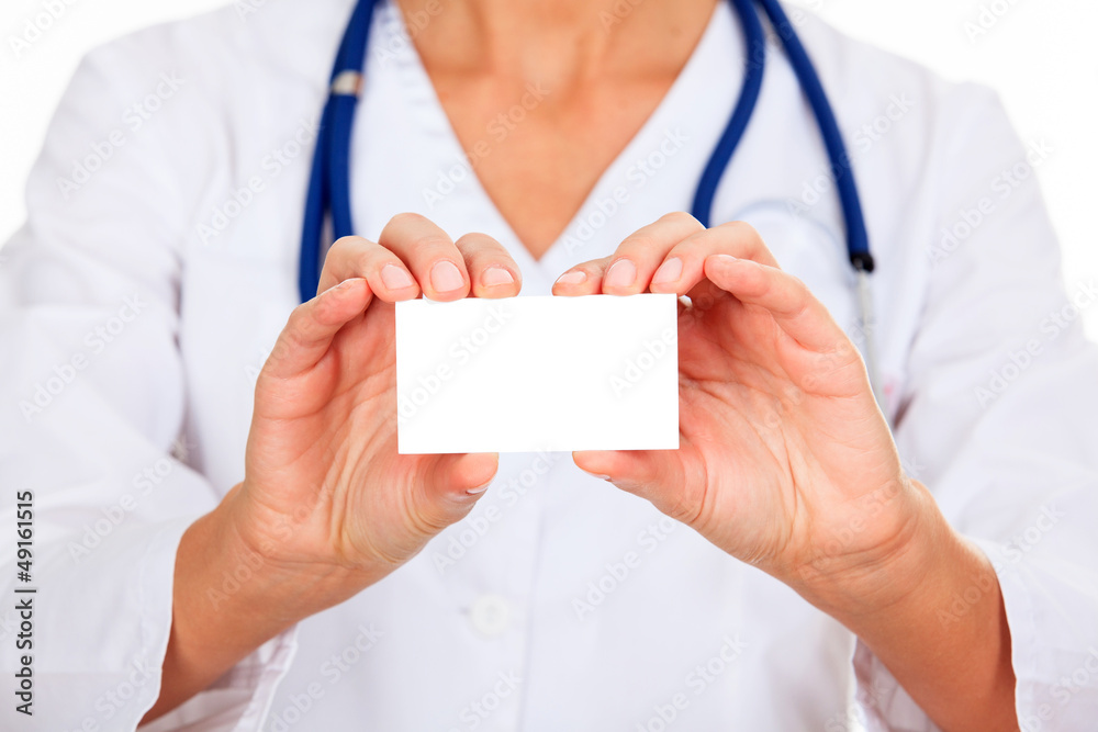 Female doctor shows empty white card Female doctor shows empty white card