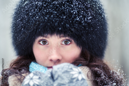 Close-up portrait of beautiful winter woman