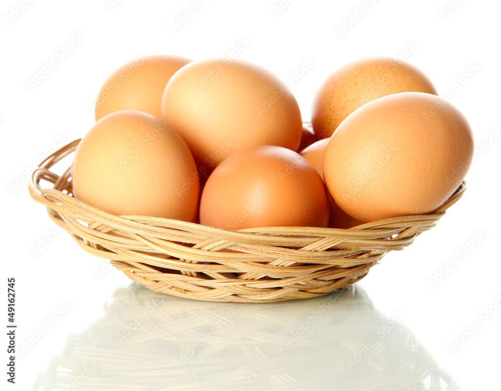 Many eggs in basket isolated on white Many eggs in basket isolated on white