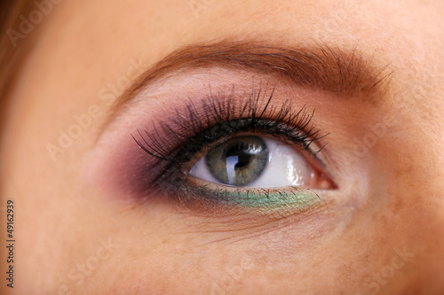 Beautiful female eye with bright make-up, close up