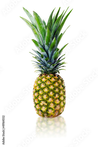 ripe whole pineapple isolated on white background