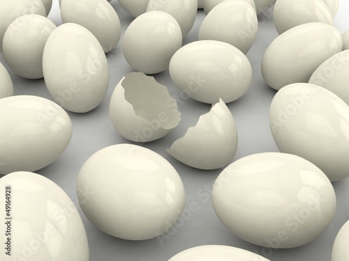 Broken egg among eggs. Wealth concept.