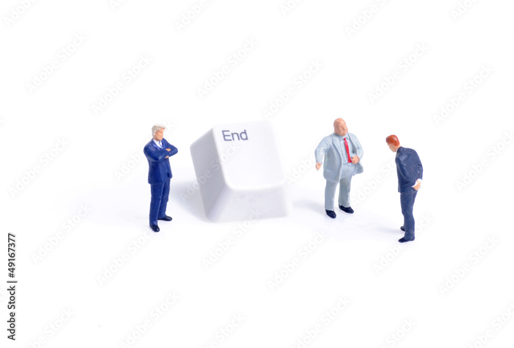 tiny figures of businessman stands next to end key tiny figures of businessman stands next to end key
