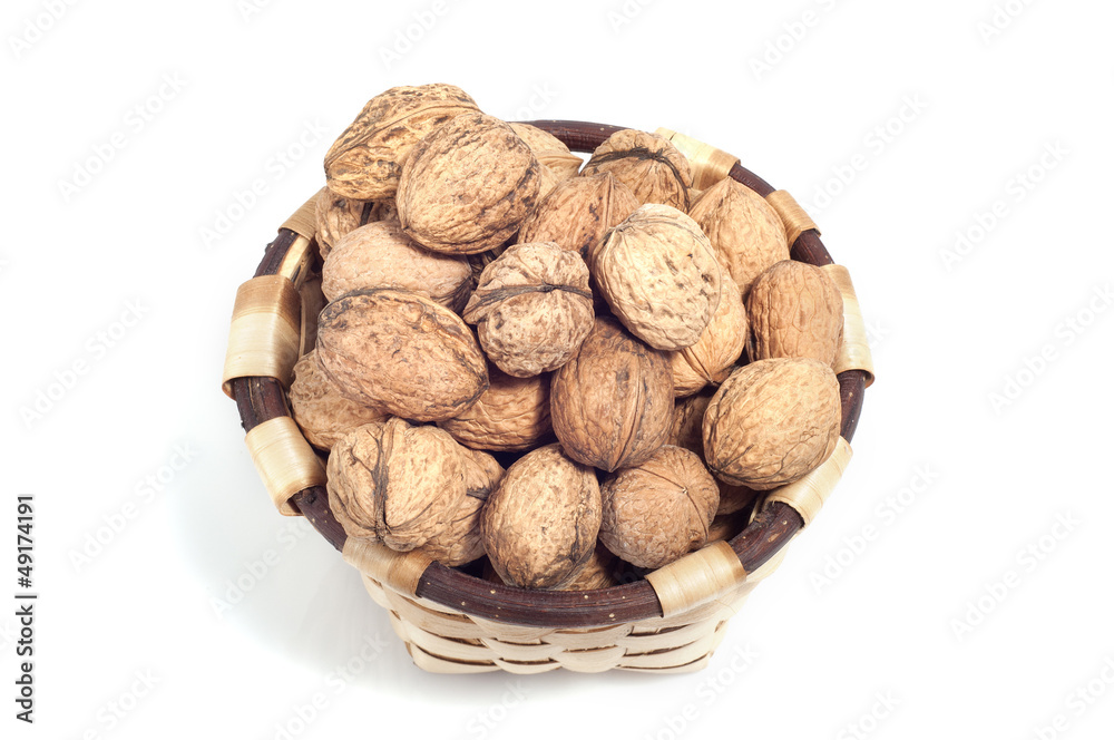 basket of nuts, autumn fruits, isolated on white basket of nuts, autumn fruits, isolated on white