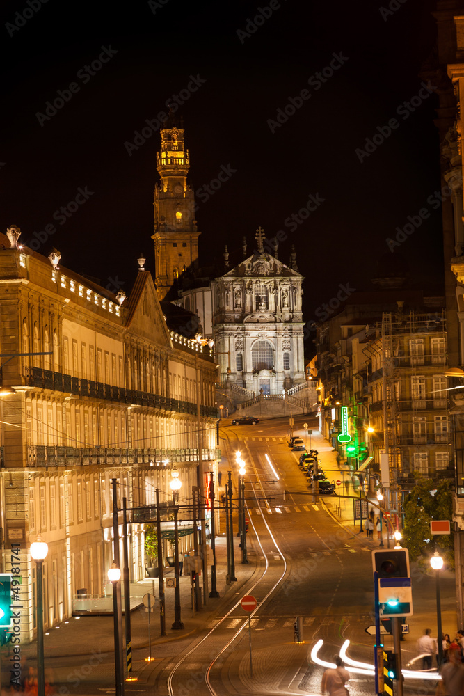 Porto street at night. Clérigos tower and church, Portugal