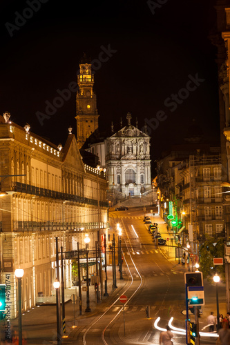 Porto street at night. Clérigos tower and church, Portugal