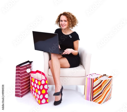 Girl shopping onlie via internet photo