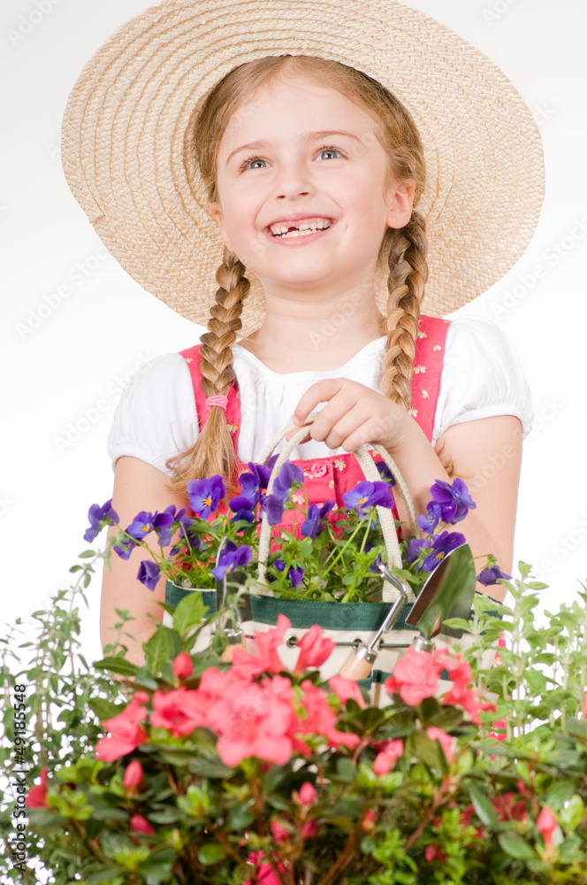 Gardening - lovely gardener with flowers seedlings