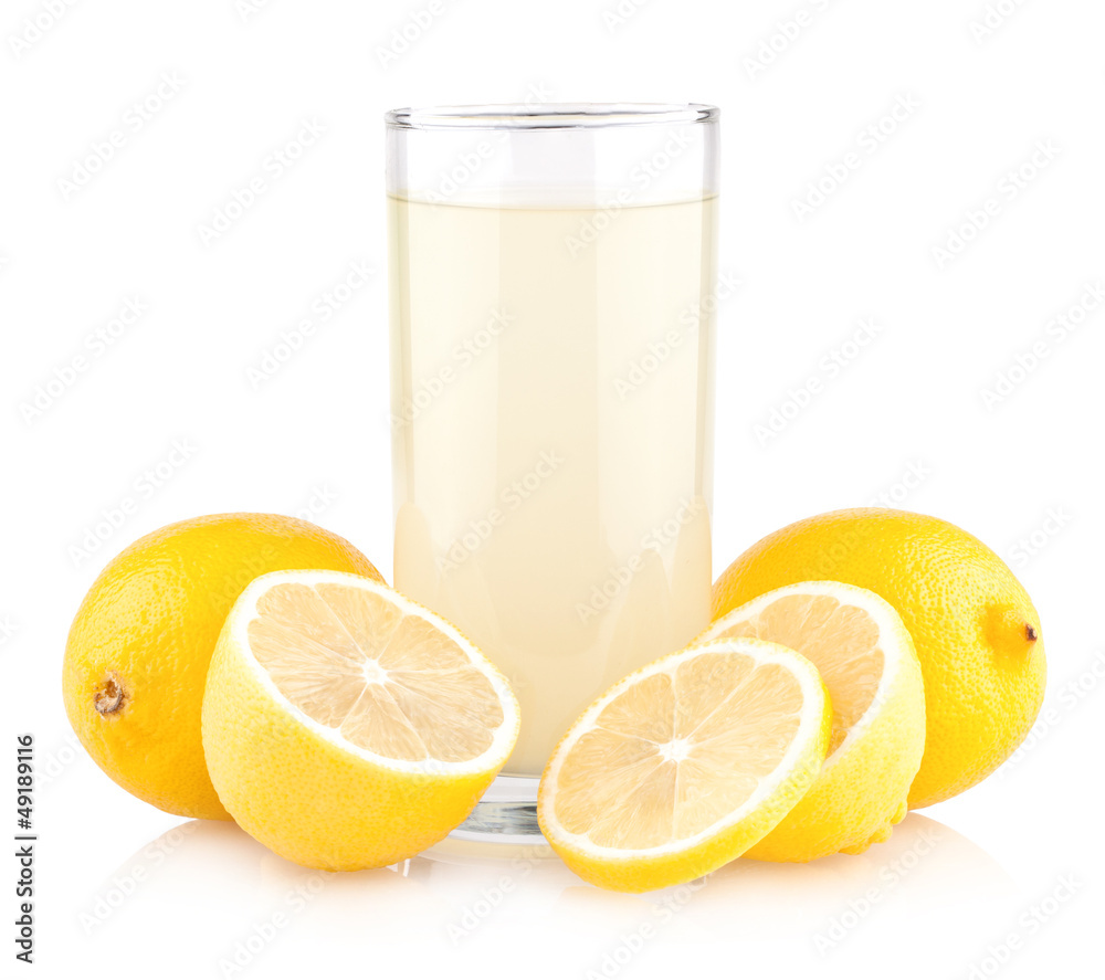 Glass of lemon juice with lemons Glass of lemon juice with lemons